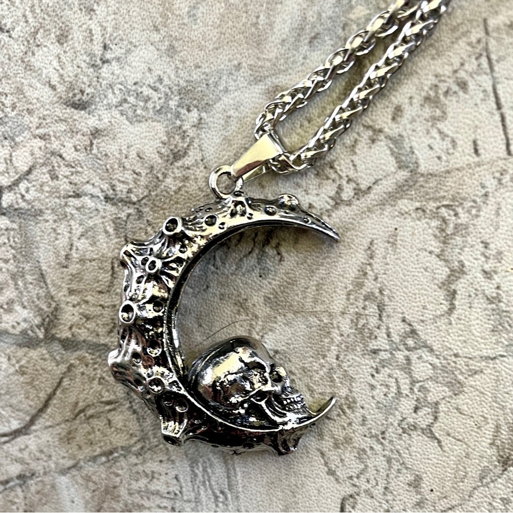 Silver crescent moon with Skull
